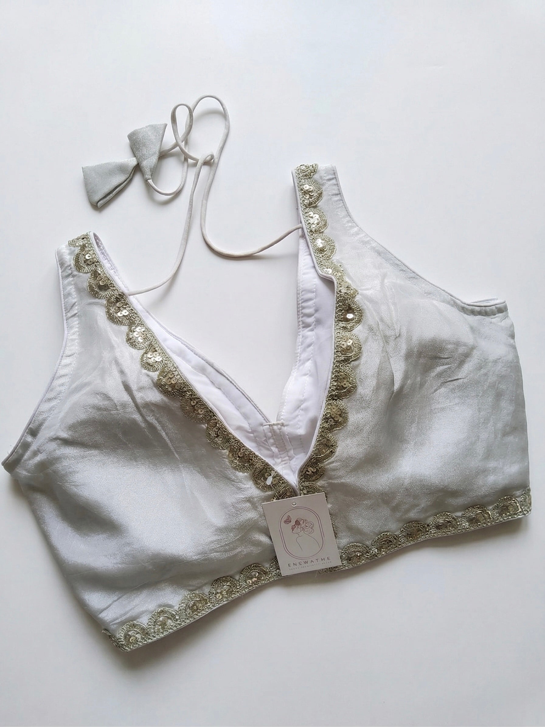 V-neck silk blouse with sequin work