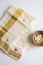 Kerala kasavu saree with small flower embroidered motifs