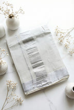 Kerala silver plain tissue saree with silver zari