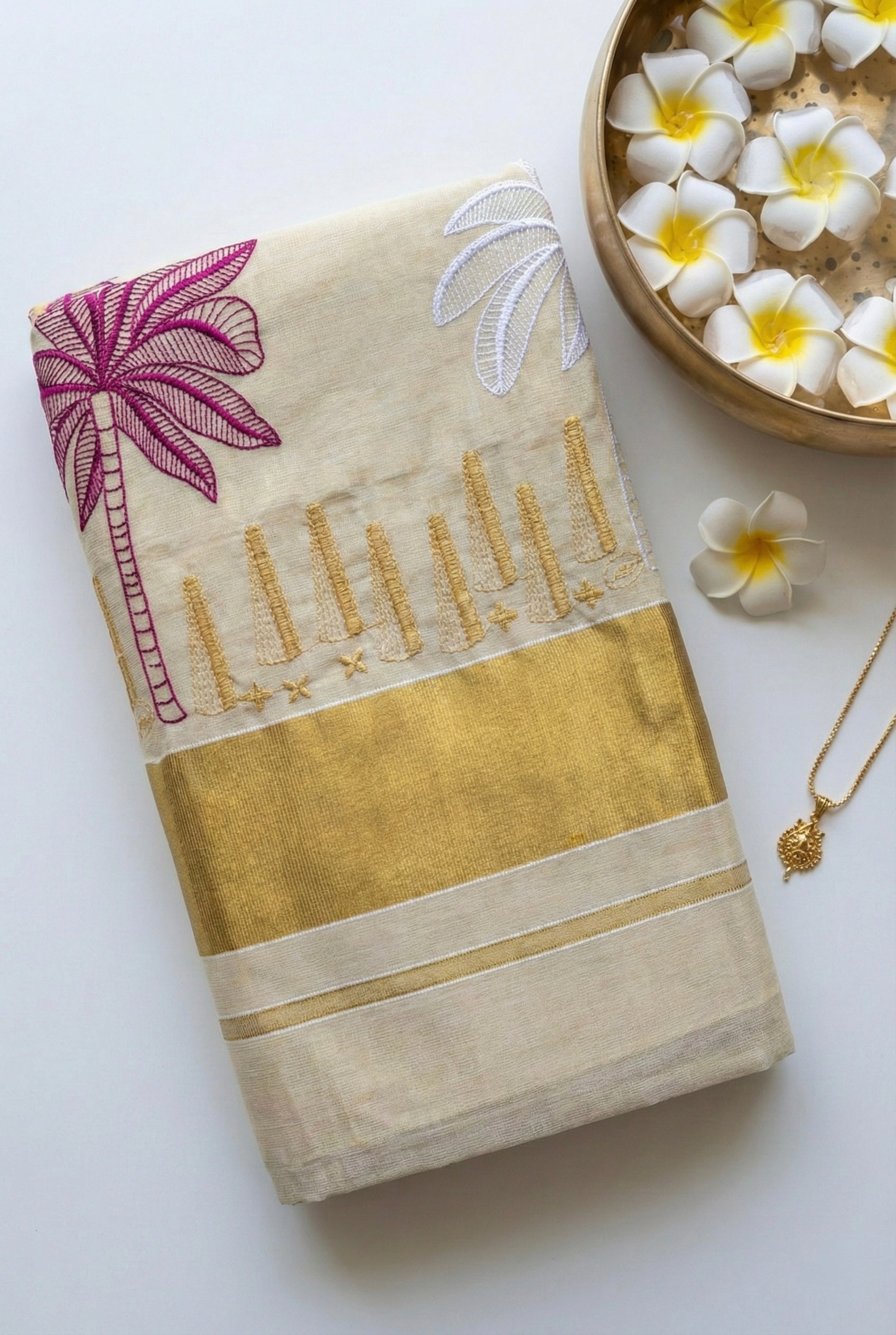 Kerala kasavu saree with coconut tree embroidery