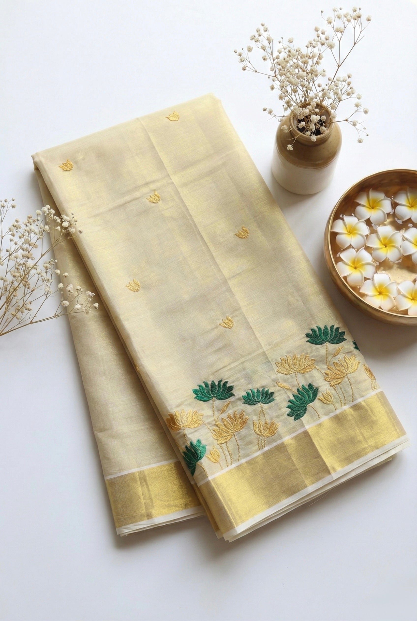 Kerala kasavu saree in lotus embroidery