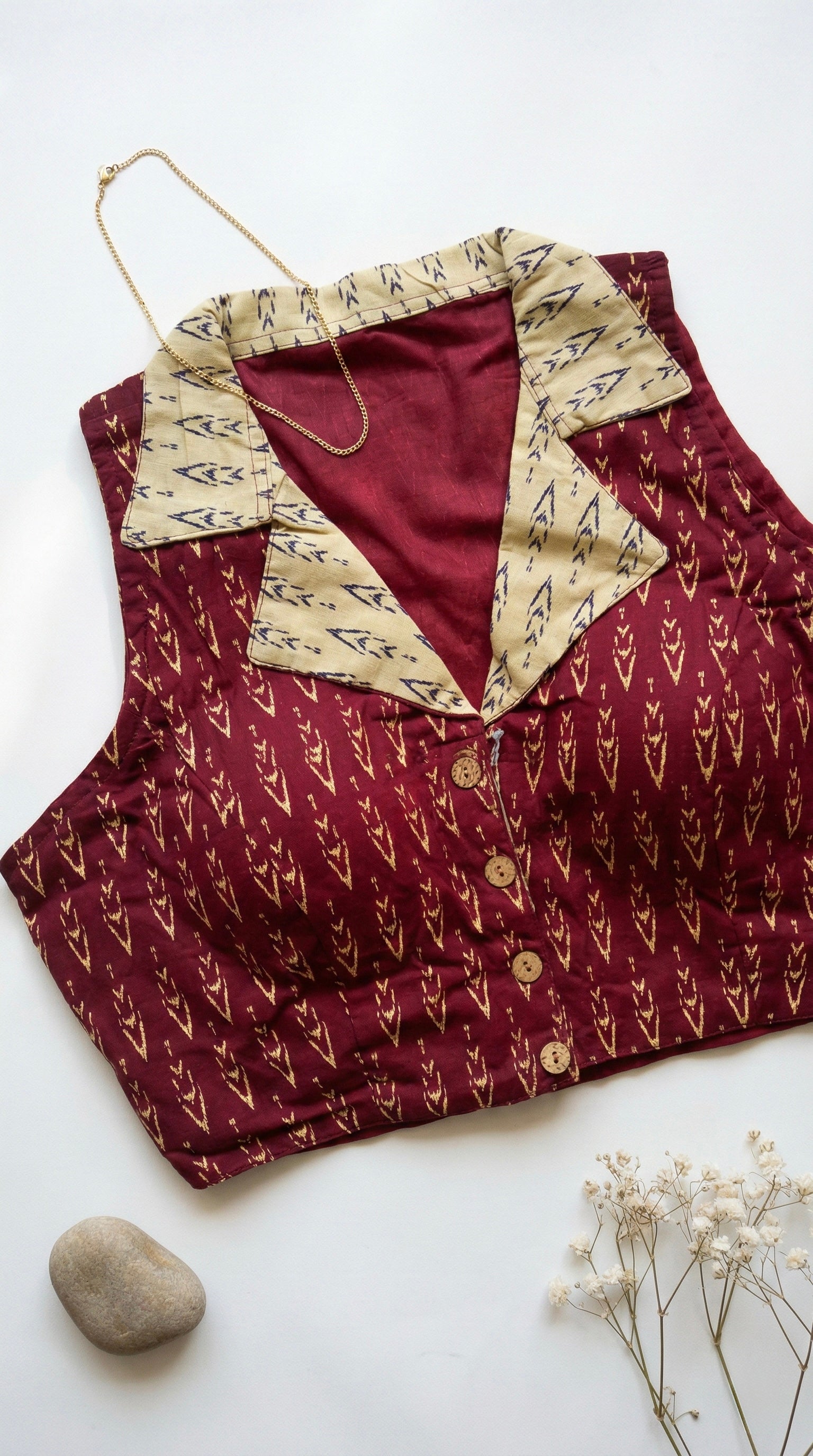 Ikkat notched collar padded sleeveless blouse