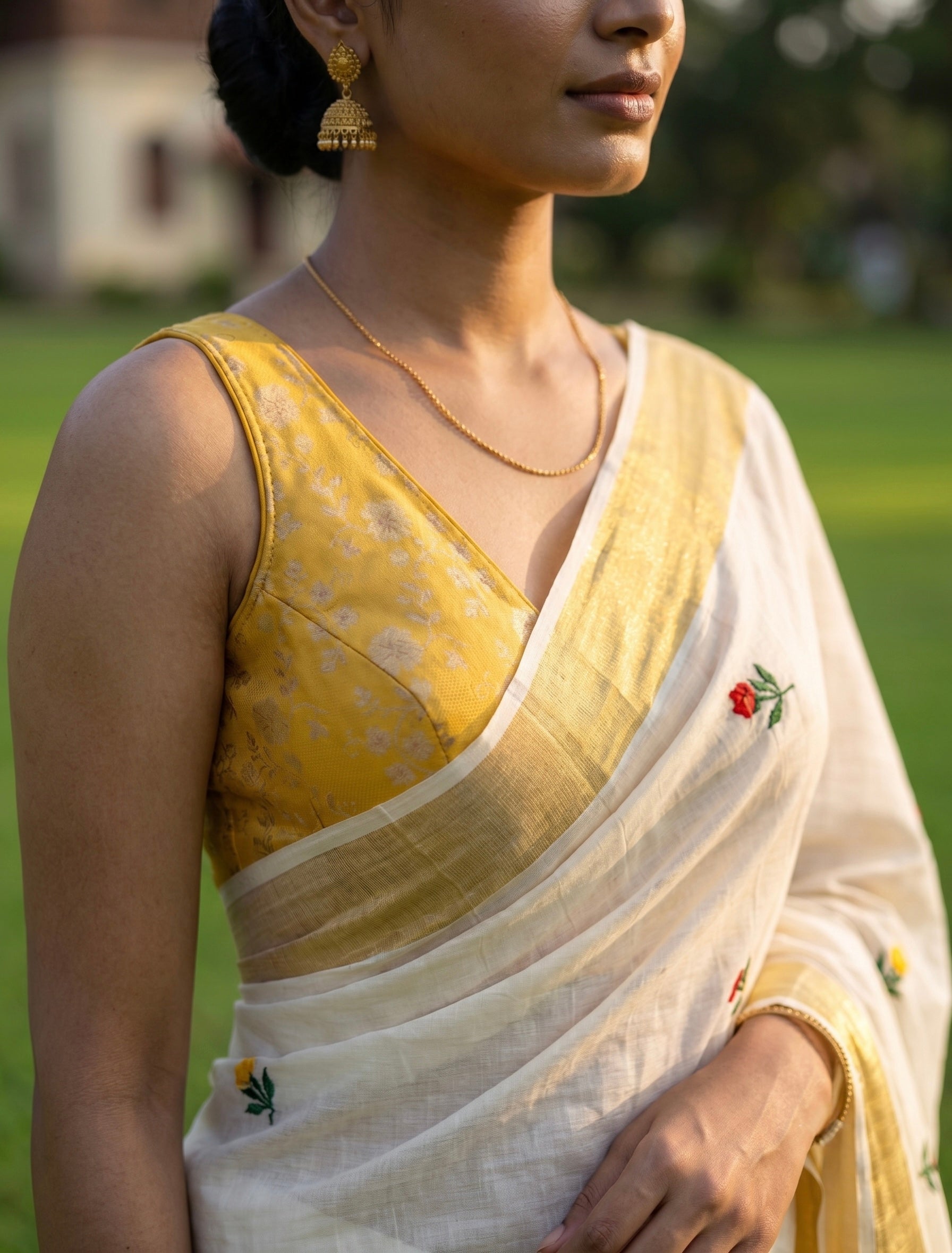 Manya-Brocade plunge neck sleeveless Blouse