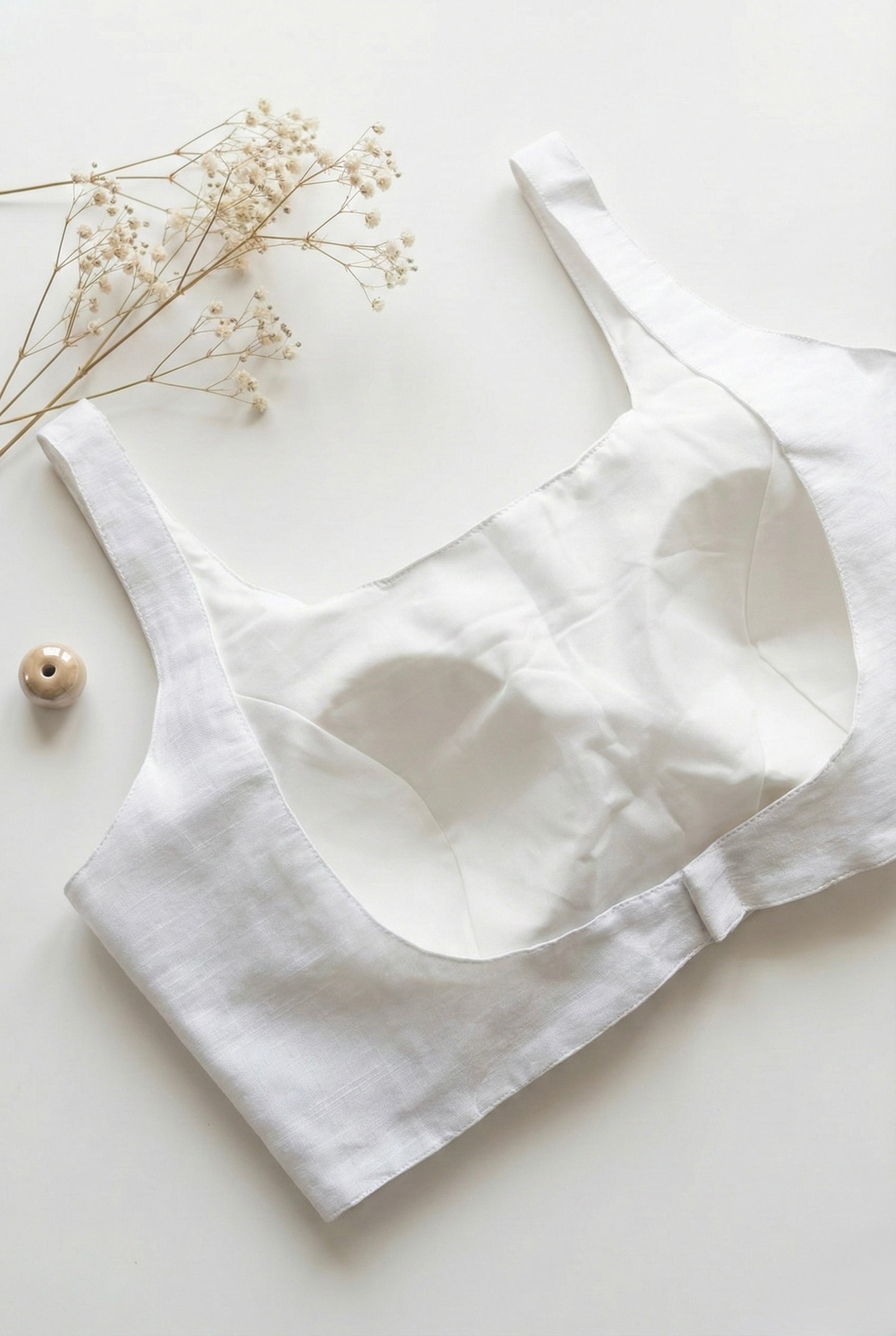 White Sleeveless u neck silk blouse