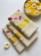 Kerala kasavu saree in tissue and lotus embroidery