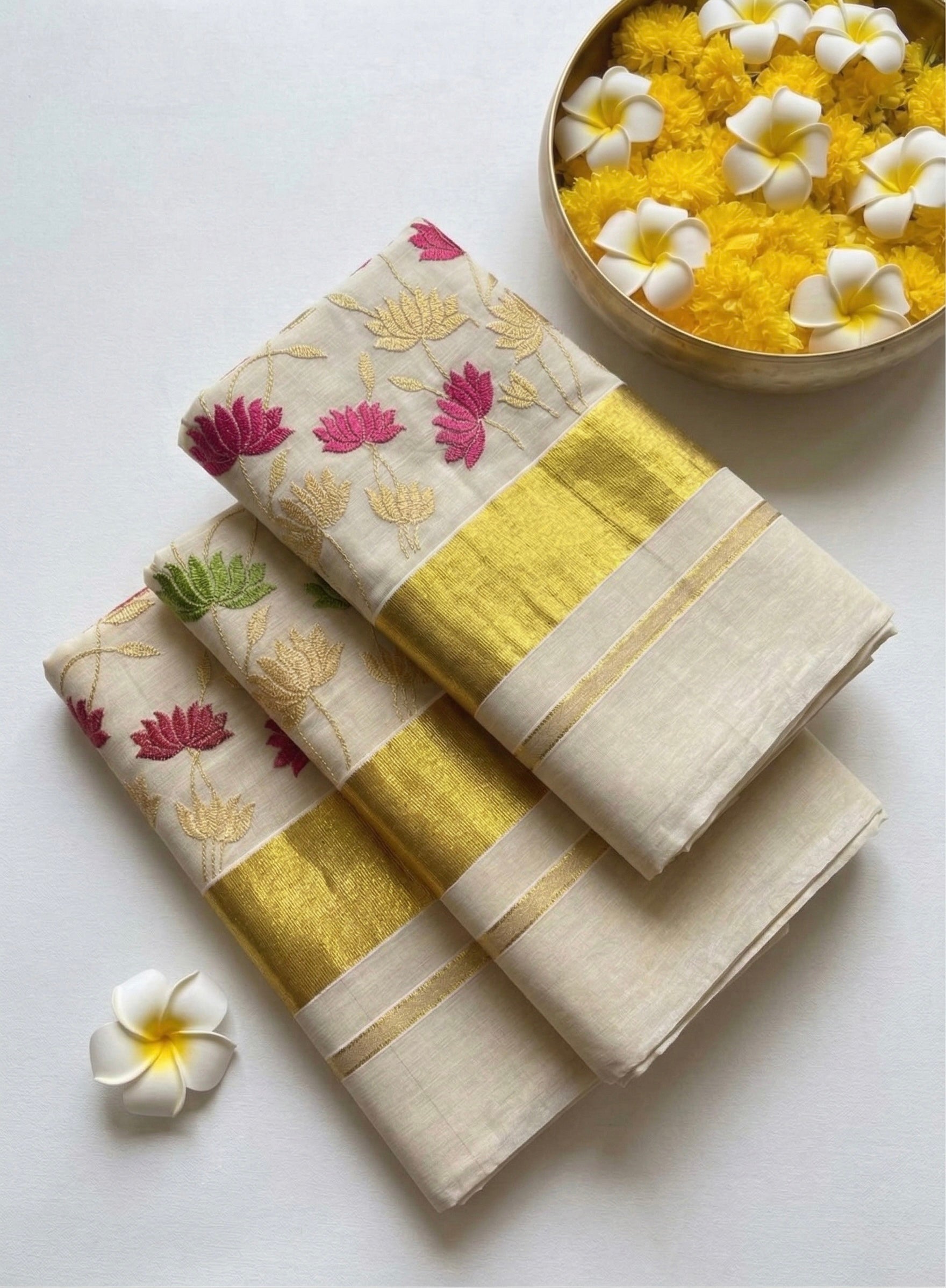 Kerala kasavu saree in tissue and lotus embroidery