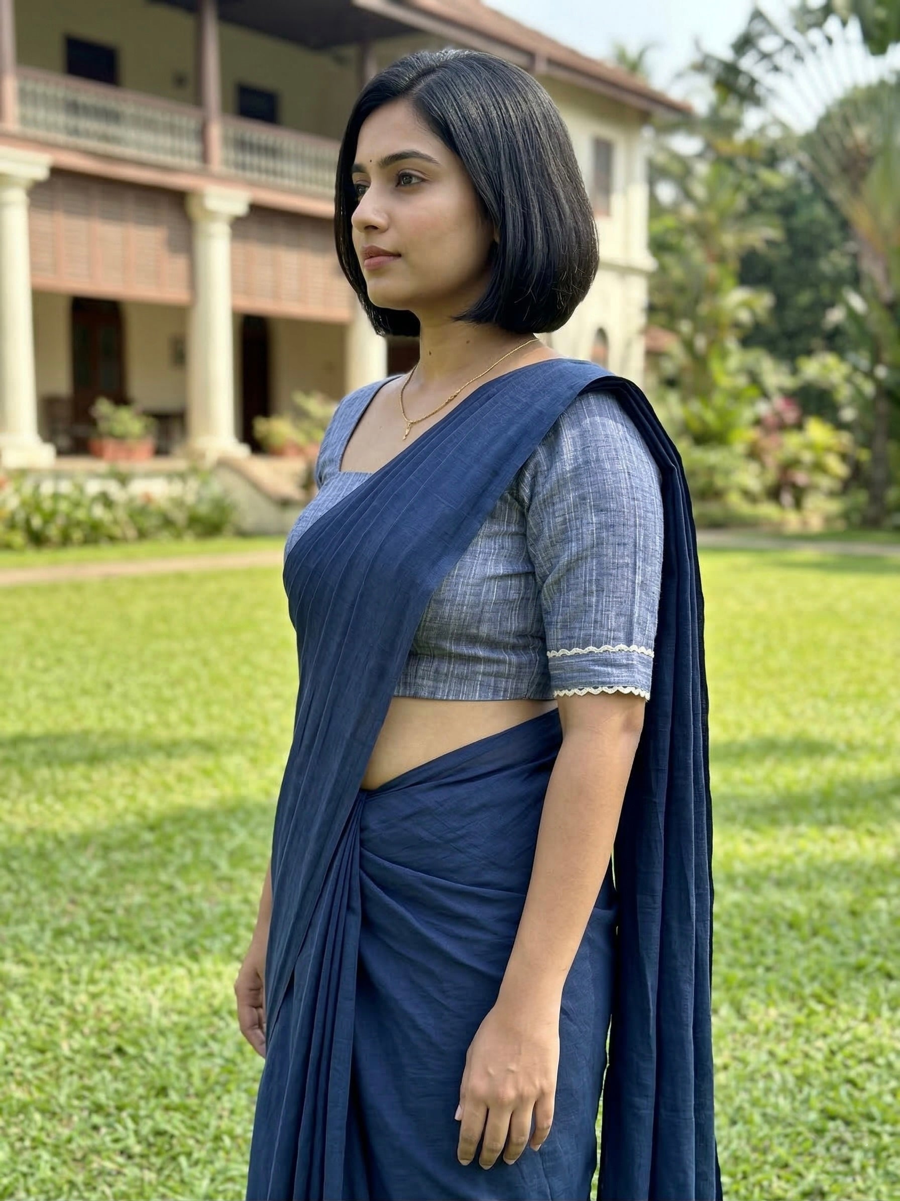 Cotton blouse with elbow length sleeves and lace detailing