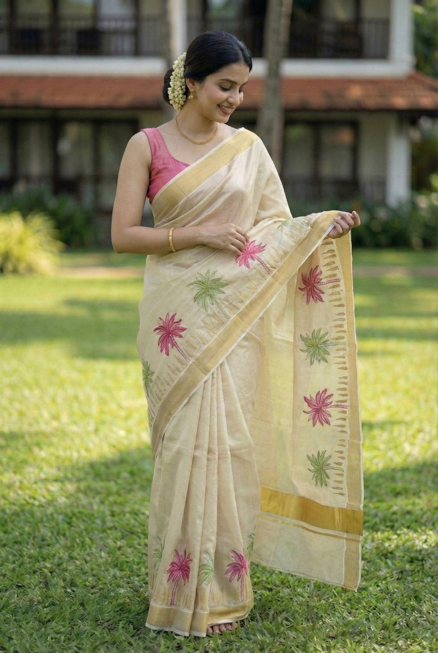 Kerala kasavu saree with coconut tree embroidery