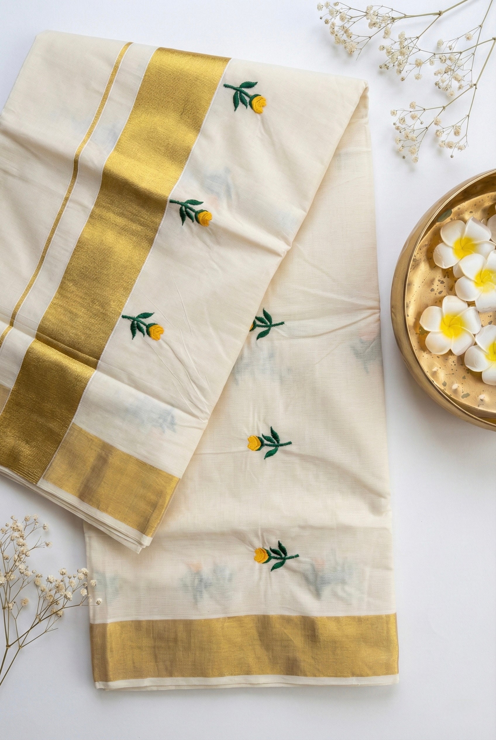 Kerala kasavu saree with tulip flower thread motifs