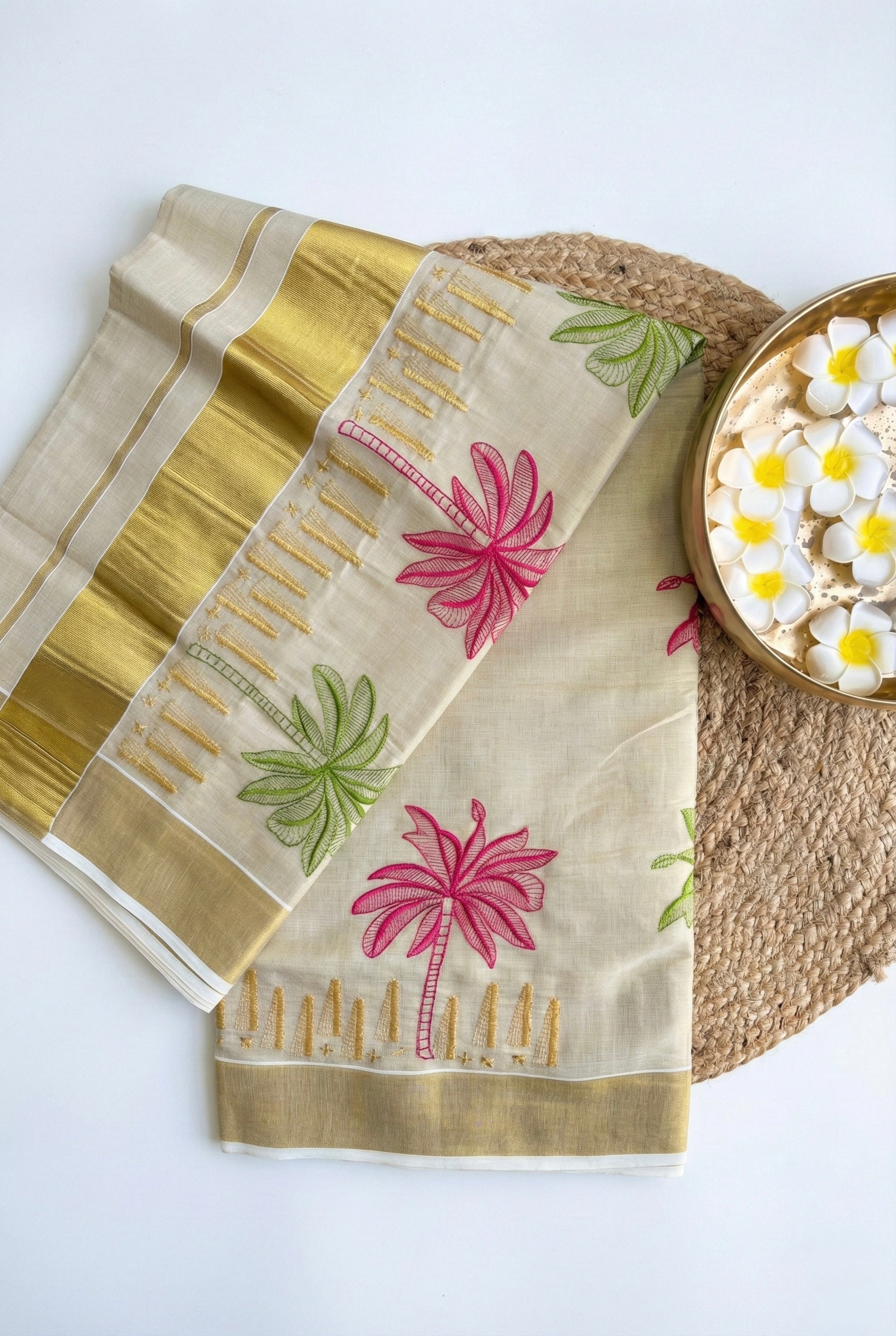 Kerala kasavu saree with coconut tree embroidery