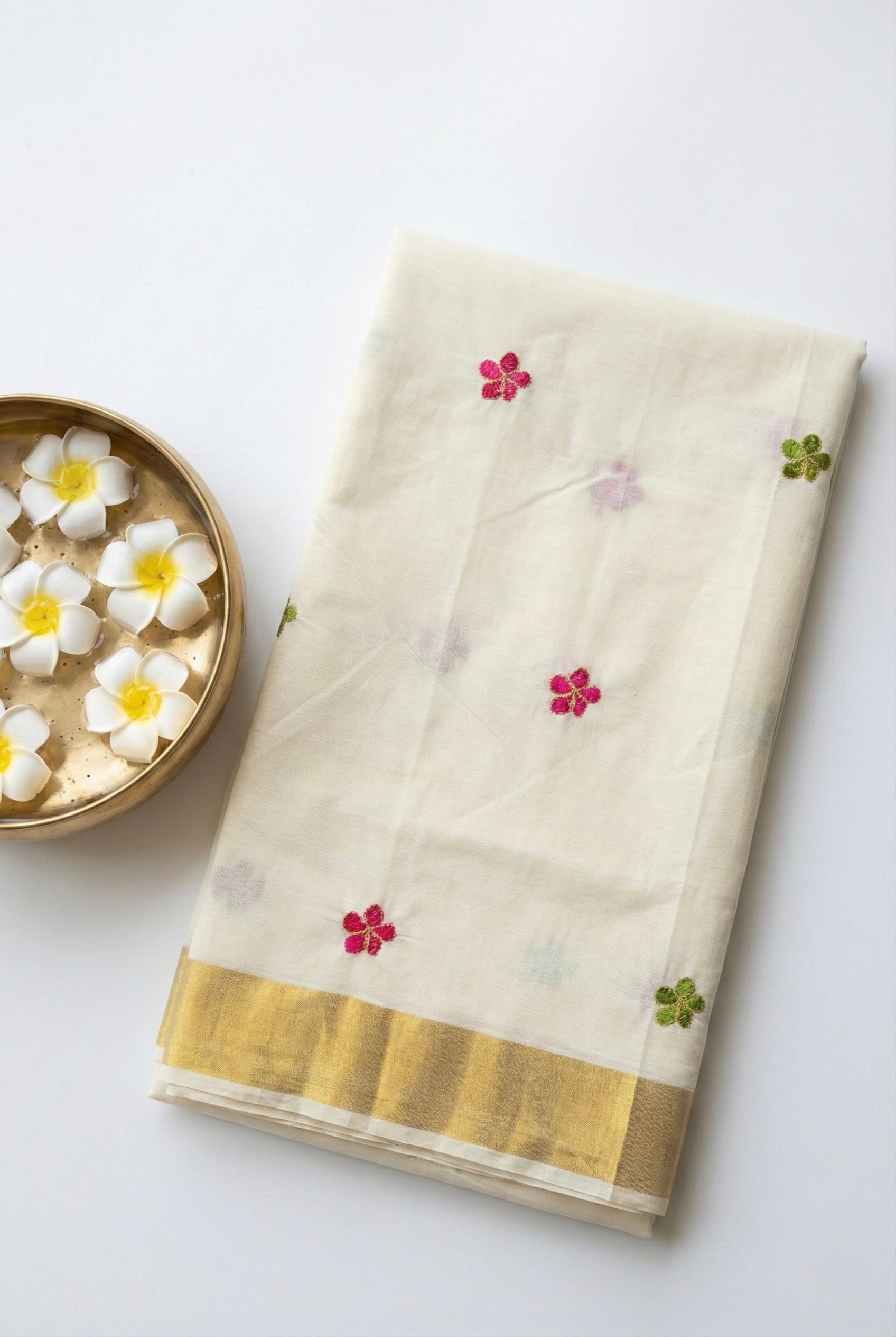 Kerala kasavu saree with small flower embroidered motifs
