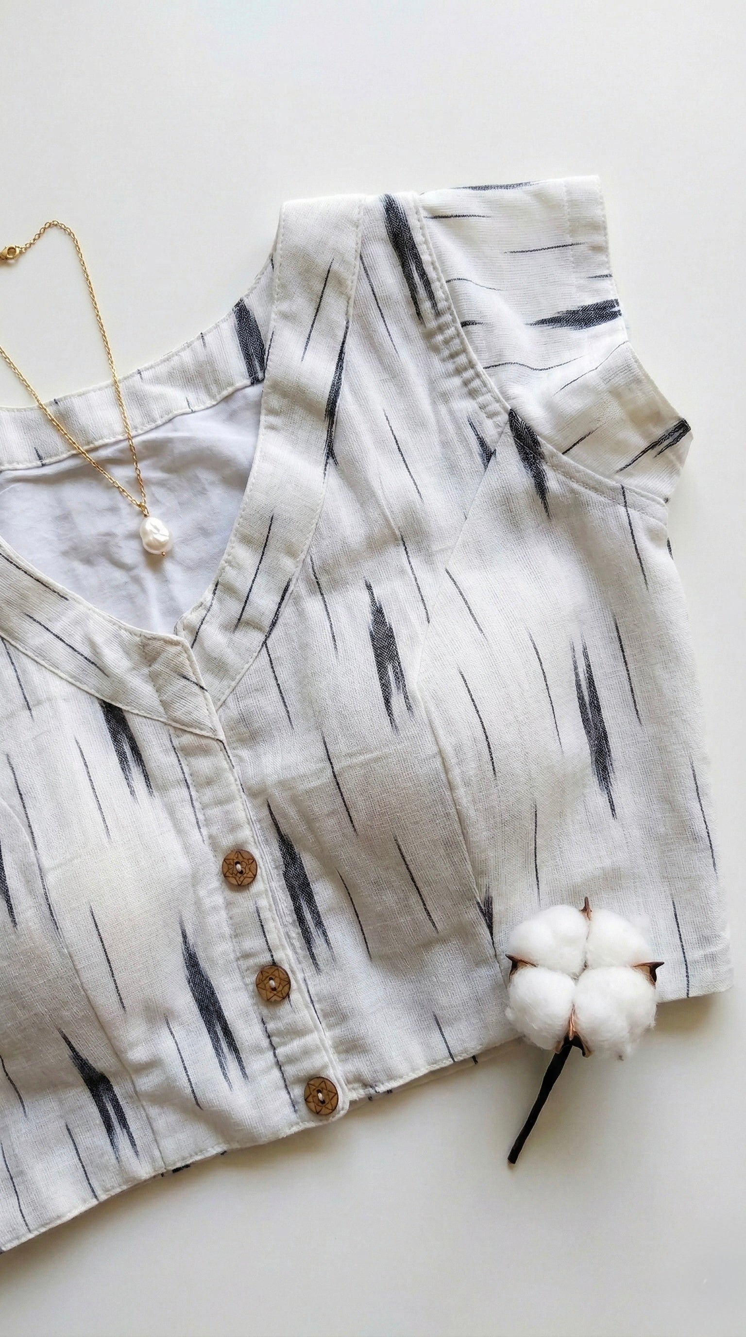 Ikkat V neck blouse with short sleeves