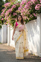 Kerala kasavu saree with small flower embroidered motifs
