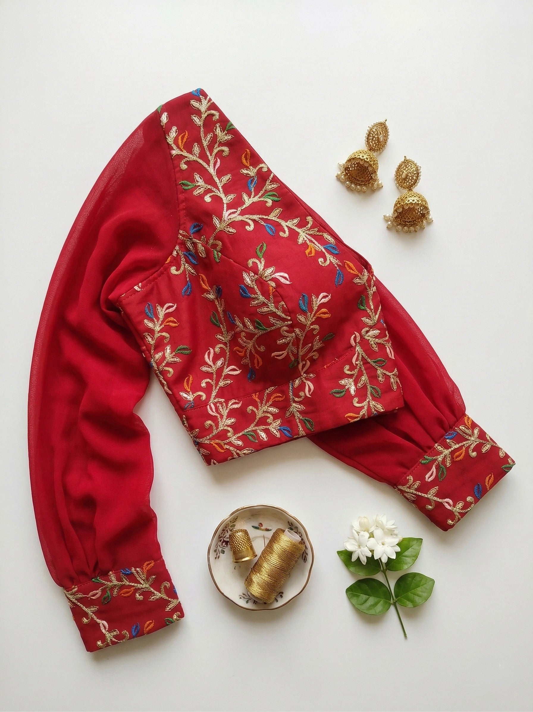 Deep V neck Bishop Sleeves Embroidered Blouse