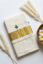 Kerala kasavu saree with tulip flower thread motifs