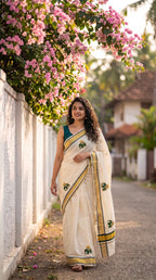 Mathangi - Kerala kasavu saree with elephant embroidered motifs