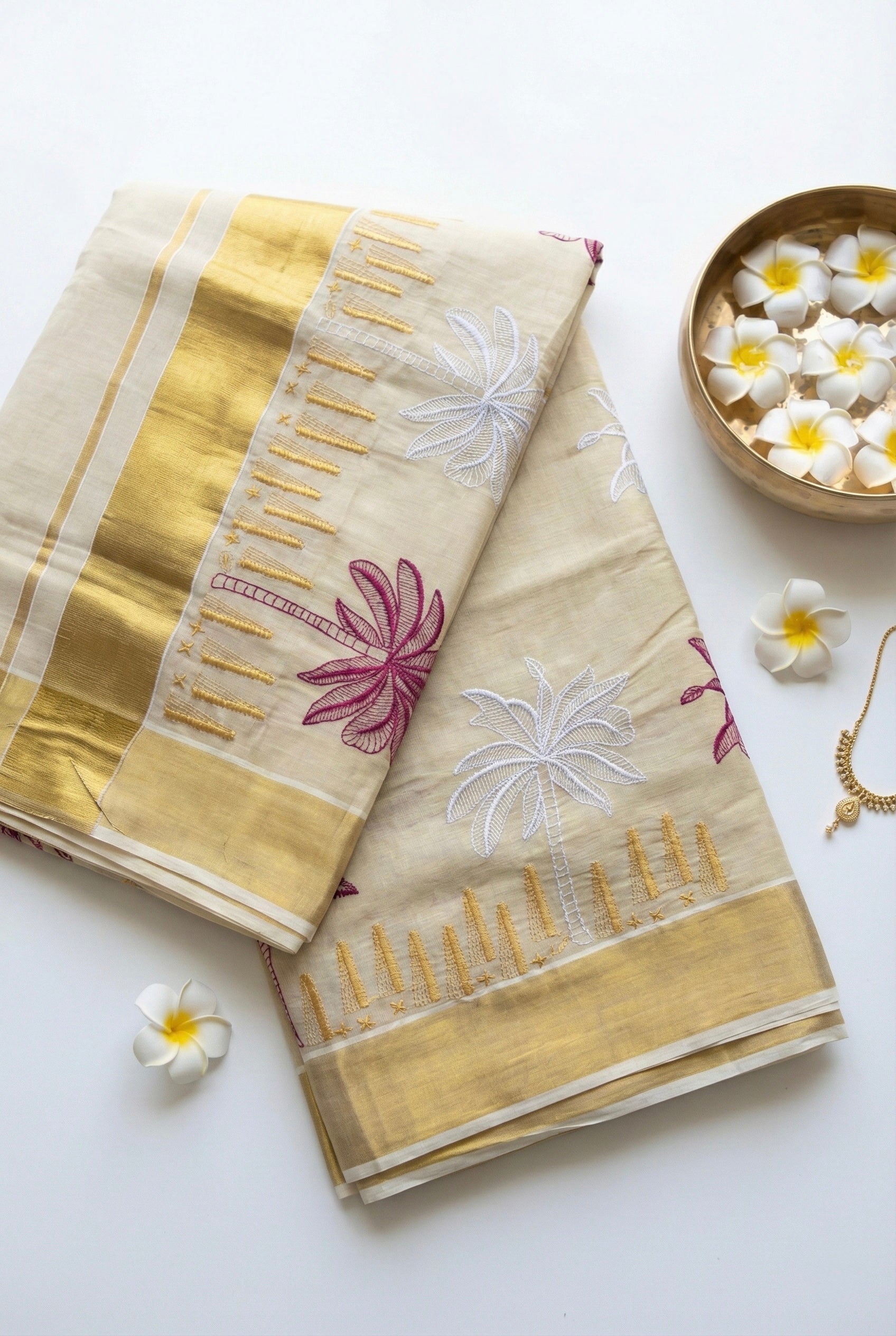 Kerala kasavu saree with coconut tree embroidery