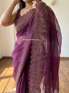 Organza saree with zari and sequin borders