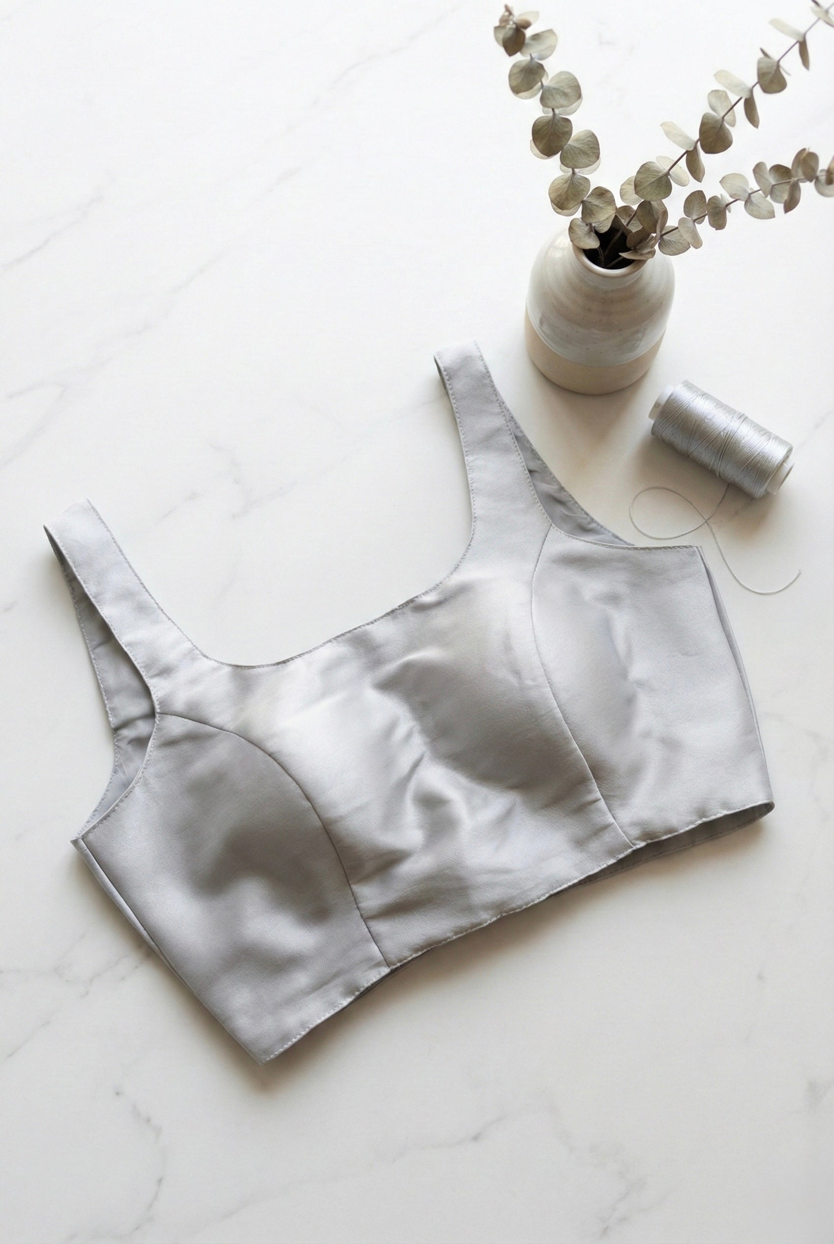 Sleeveless padded shimmer blouse