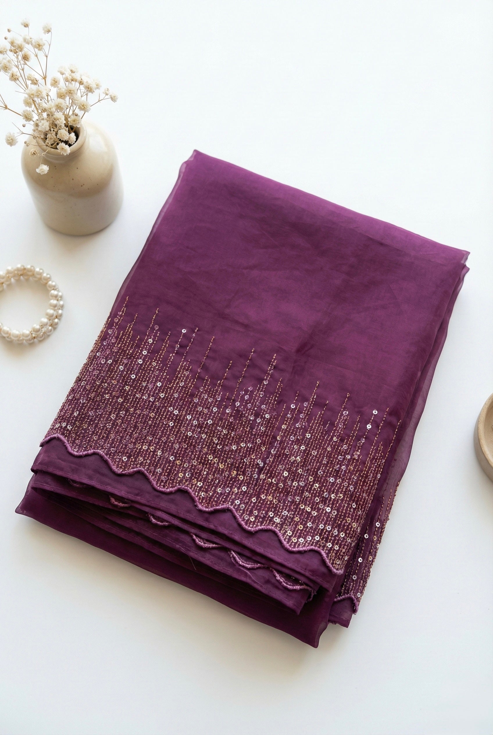 Organza saree with zari and sequin borders