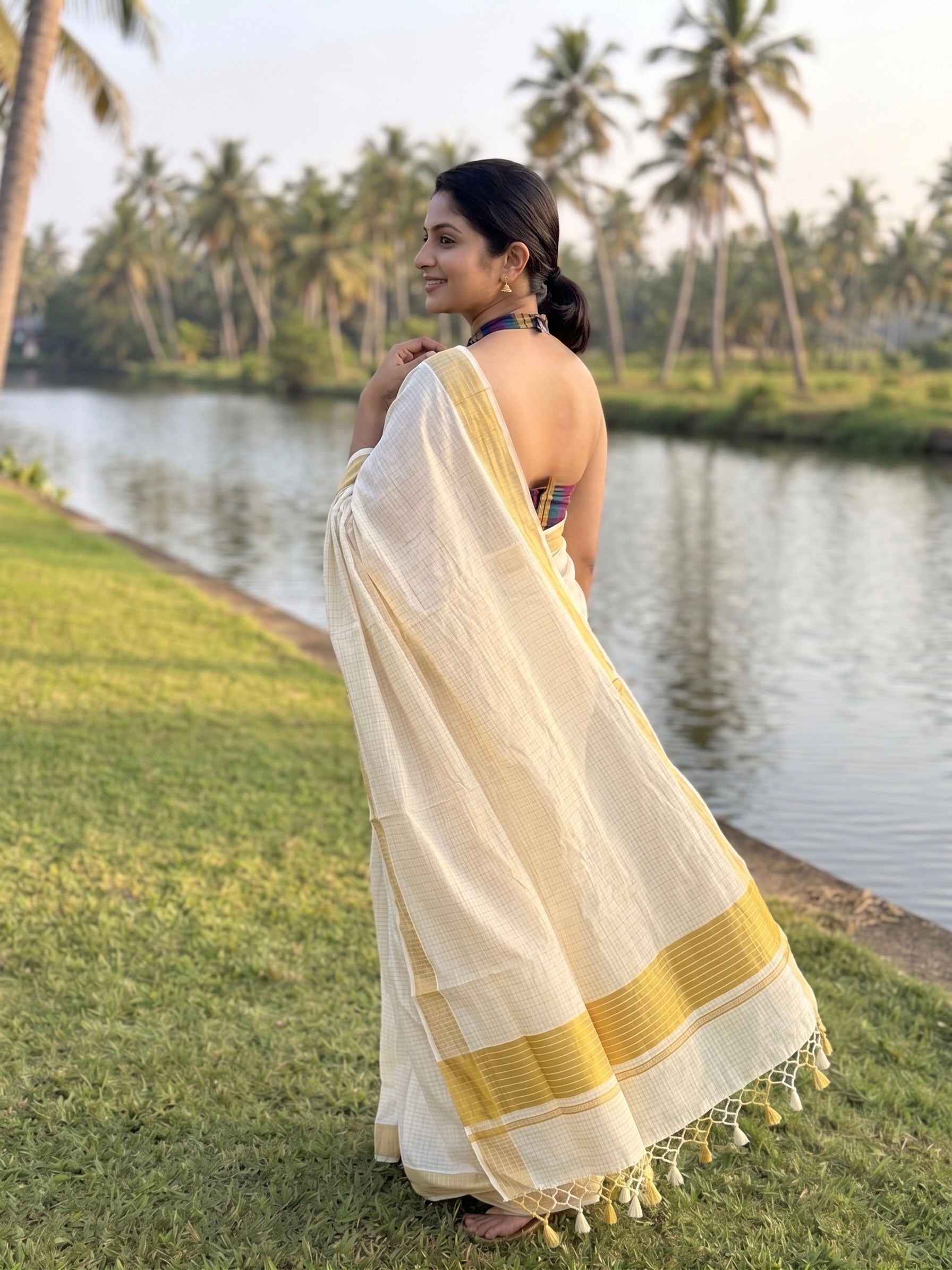 Kerala kasavu saree in silver and gold micro checks pattern