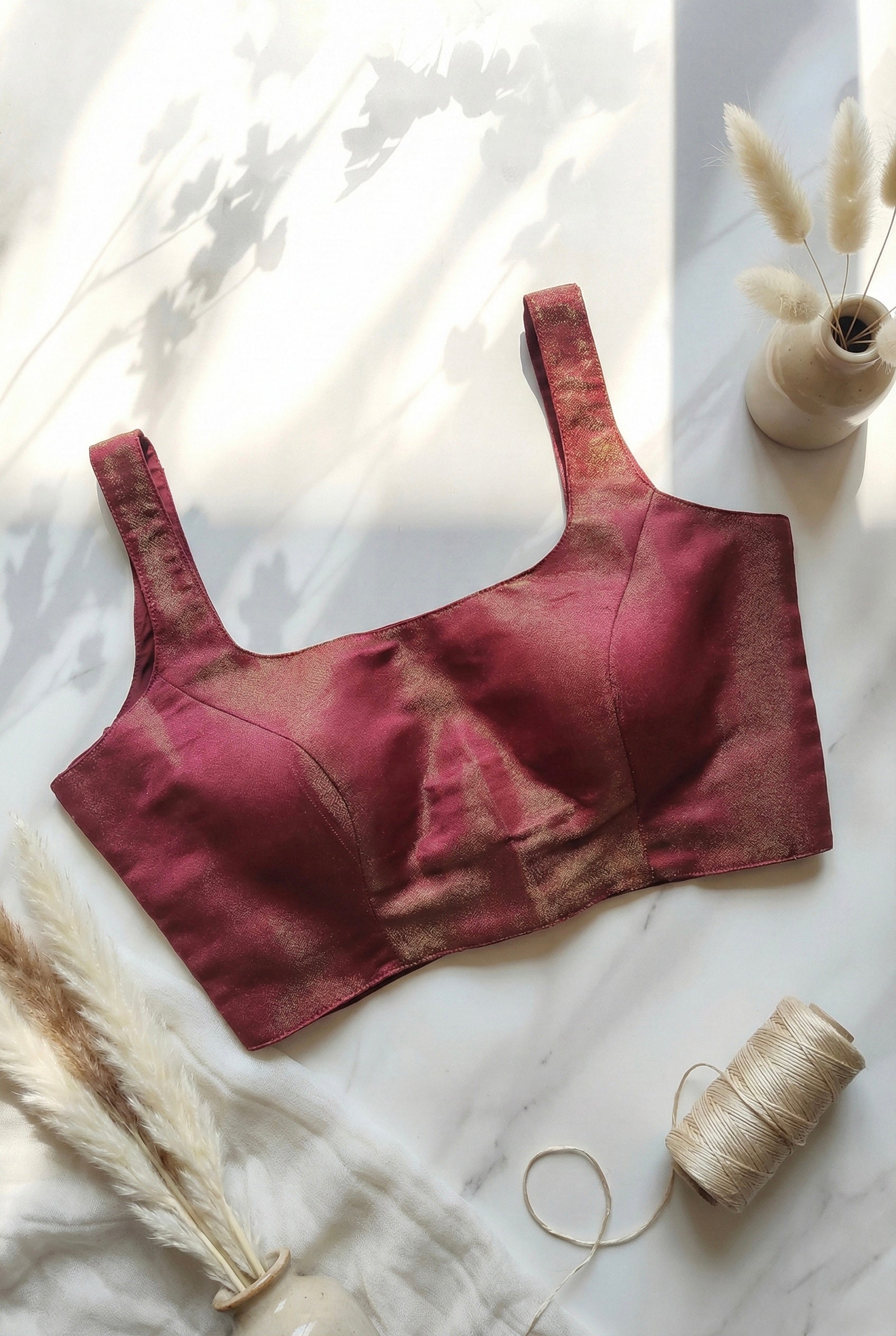 Sleeveless padded shimmer blouse