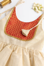 Manjadi- Gold& Red tissue ethnic frock with tie for girls