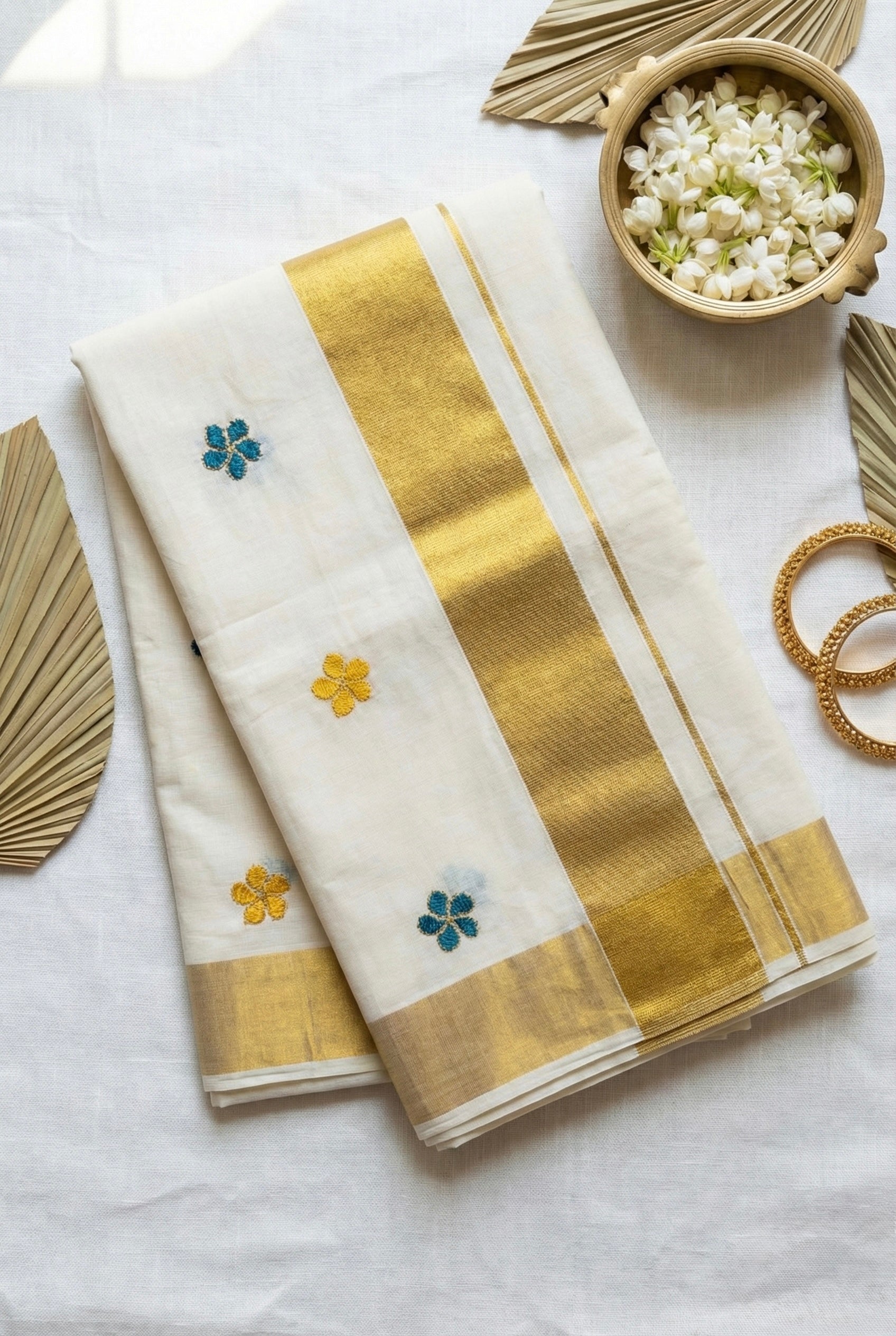 Kerala kasavu saree with small flower embroidered motifs