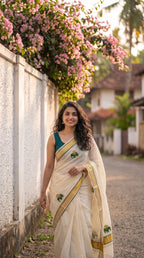 Mathangi - Kerala kasavu saree with elephant embroidered motifs