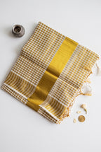 Kerala kasavu saree in gold checkered pattern