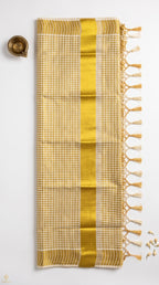 Kerala kasavu saree in gold checkered pattern