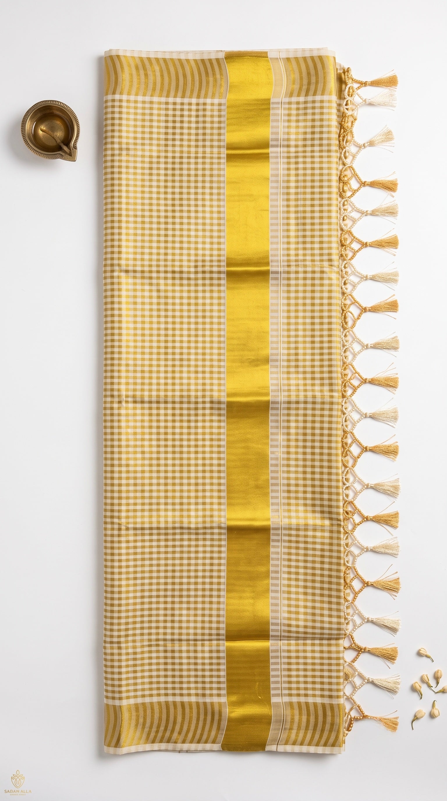 Kerala kasavu saree in gold checkered pattern