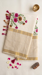 Kerala kasavu saree with handpainted floral bouquet design