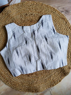 Ikkat V neck sleeveless blouse