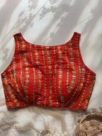 Crushed tissue embroidered blouse with tie back detailing