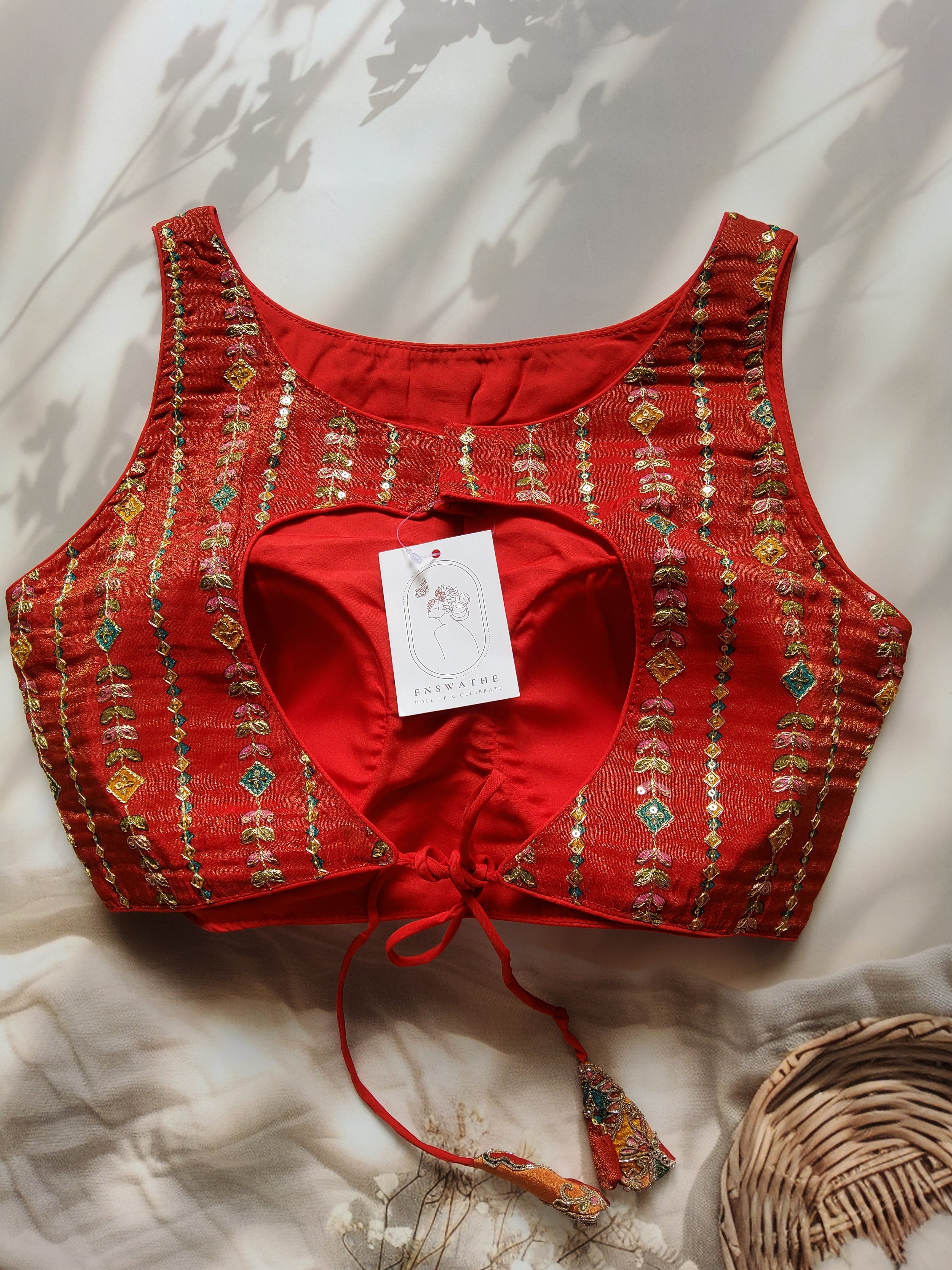 Crushed tissue embroidered blouse with tie back detailing