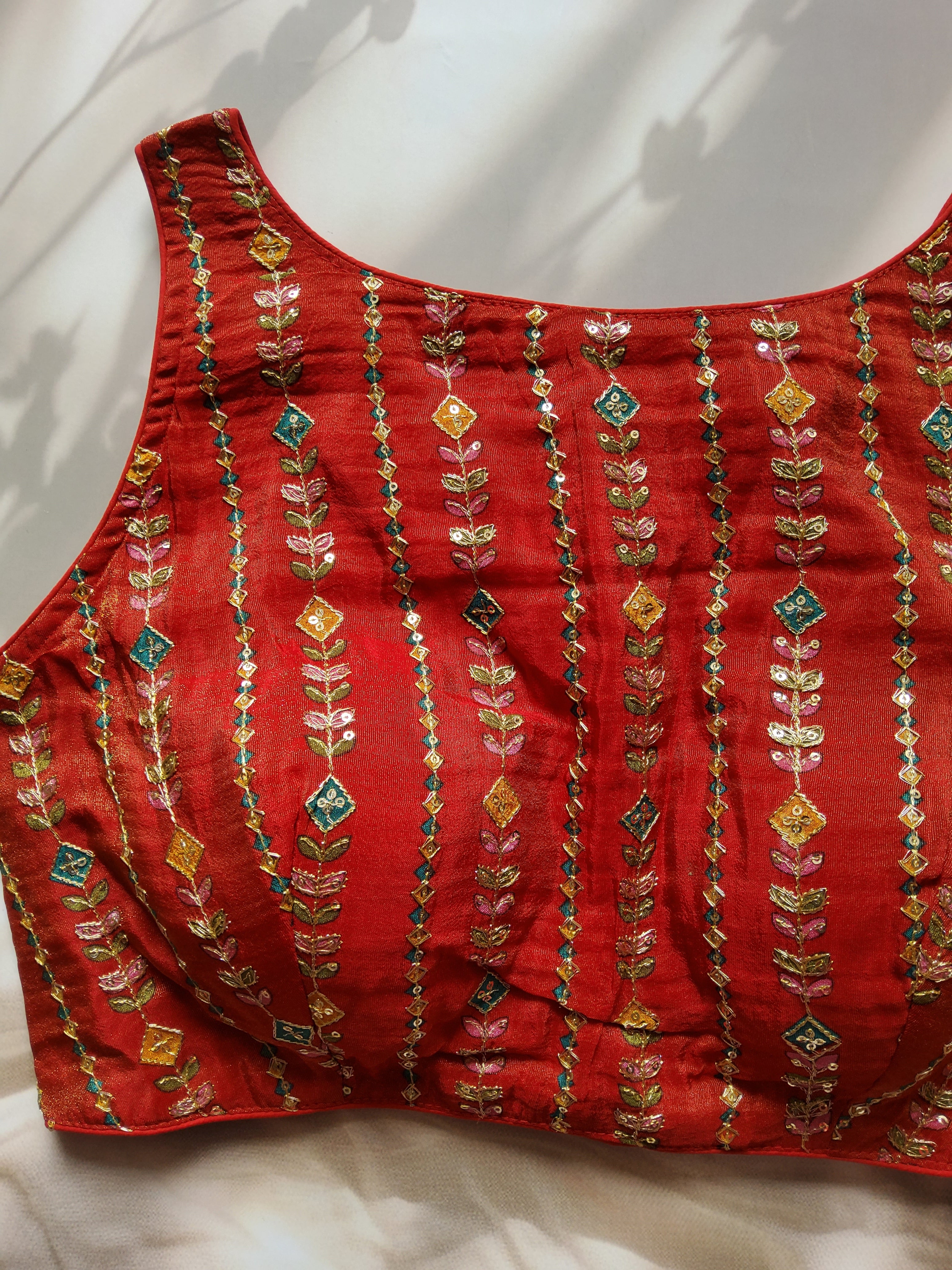 Crushed tissue embroidered blouse with tie back detailing