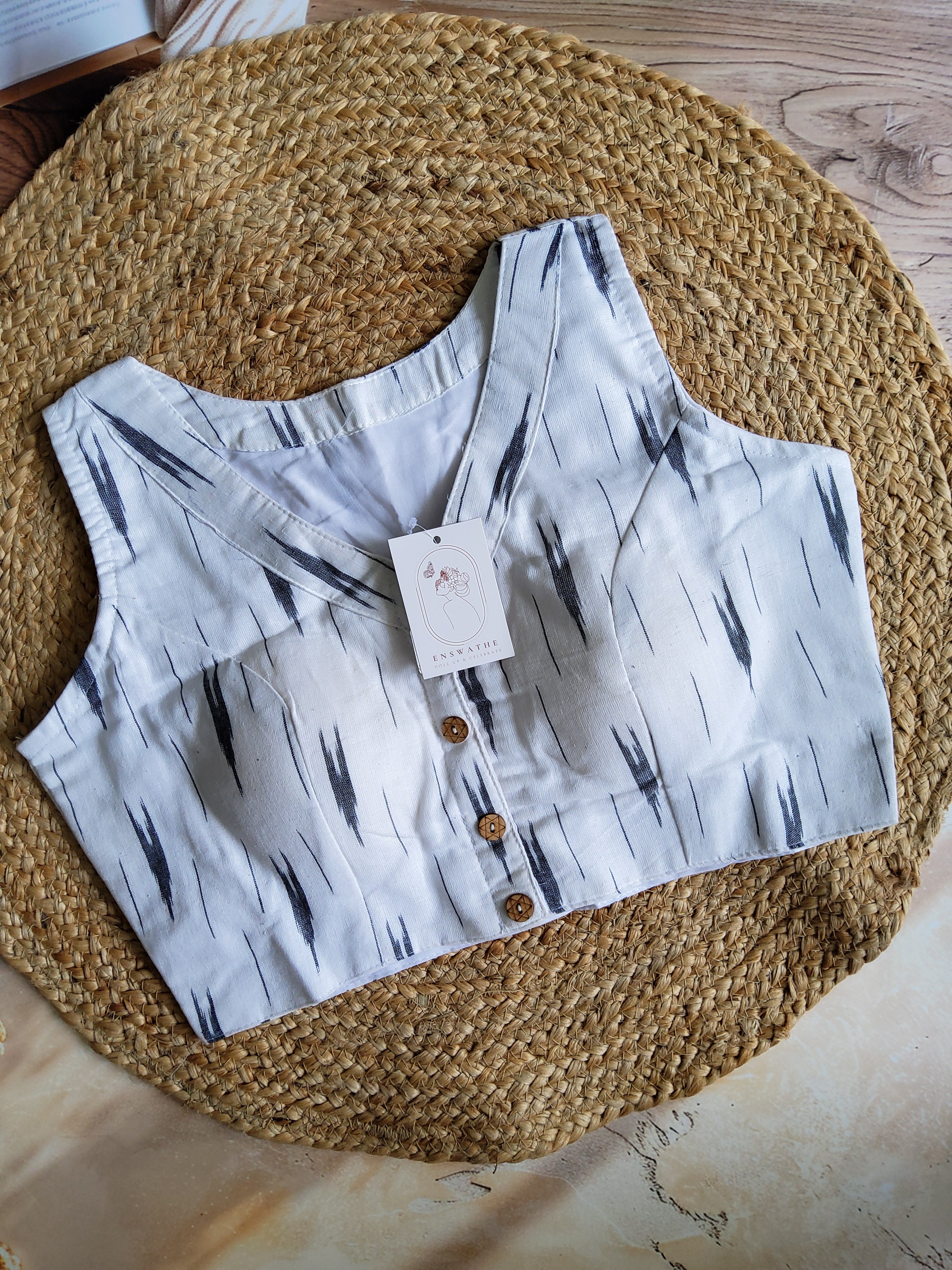 Ikkat V neck sleeveless blouse