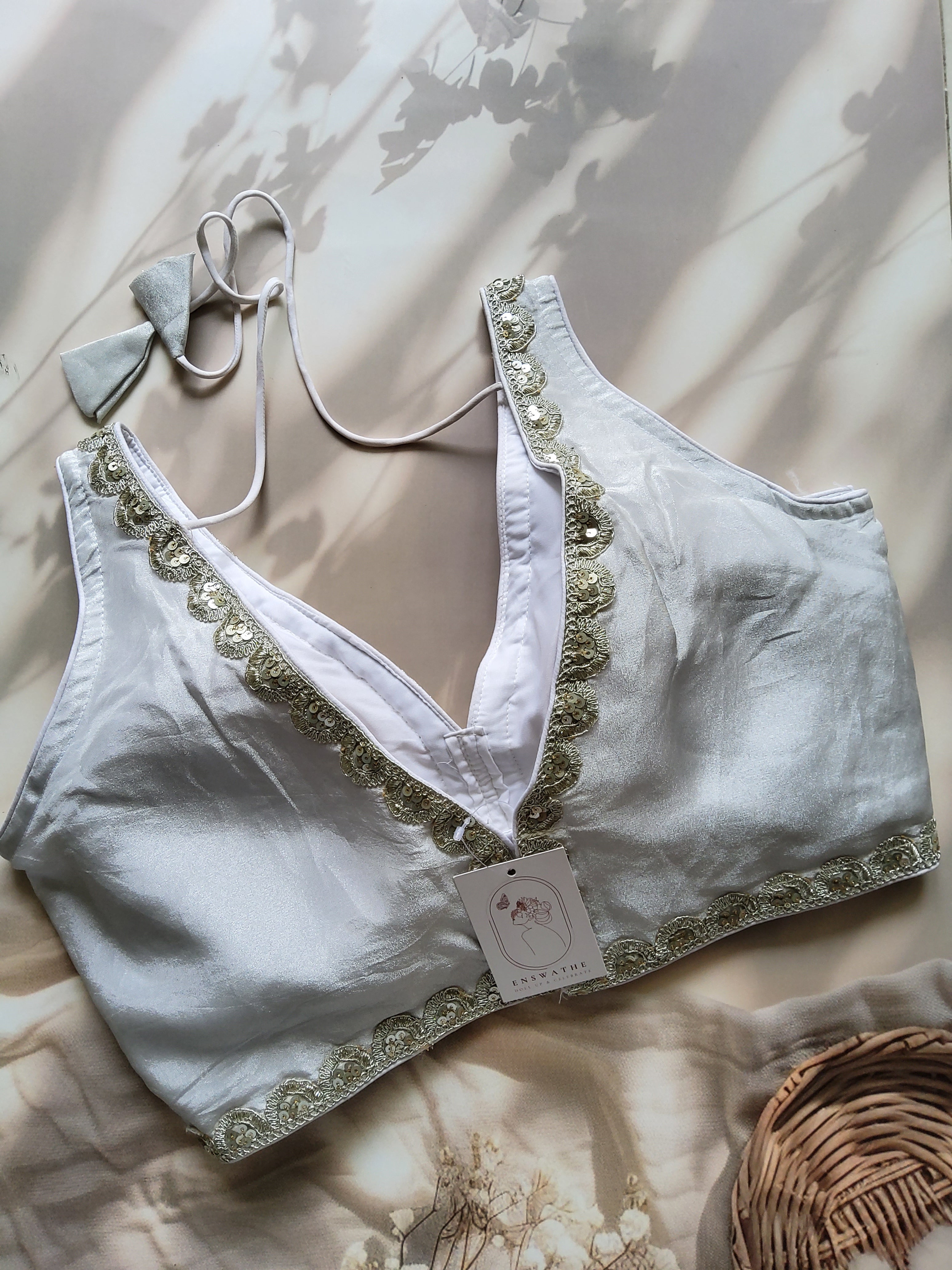 V-neck silk blouse with sequin work