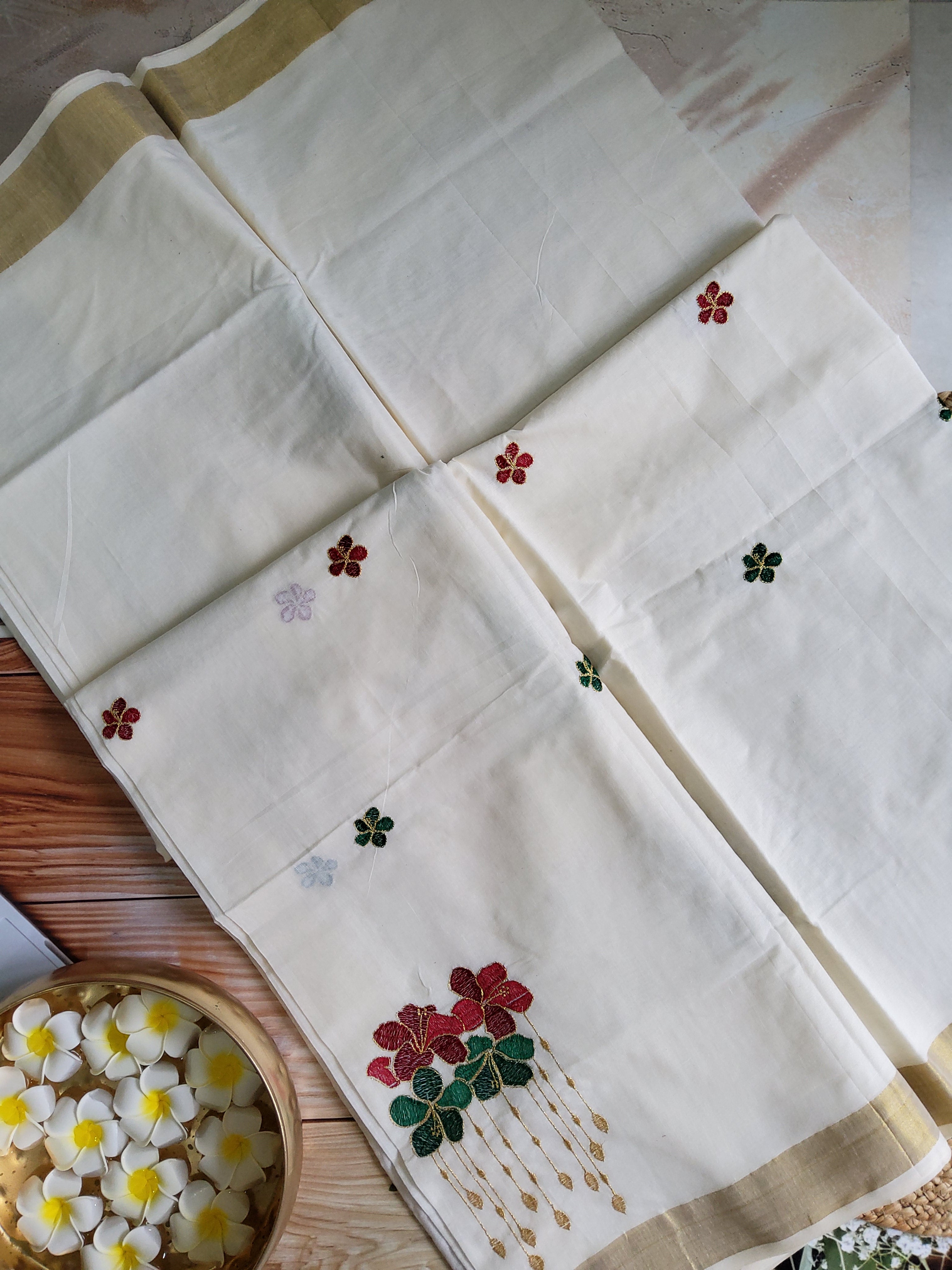 Kerala kasavu saree with floral embroidery