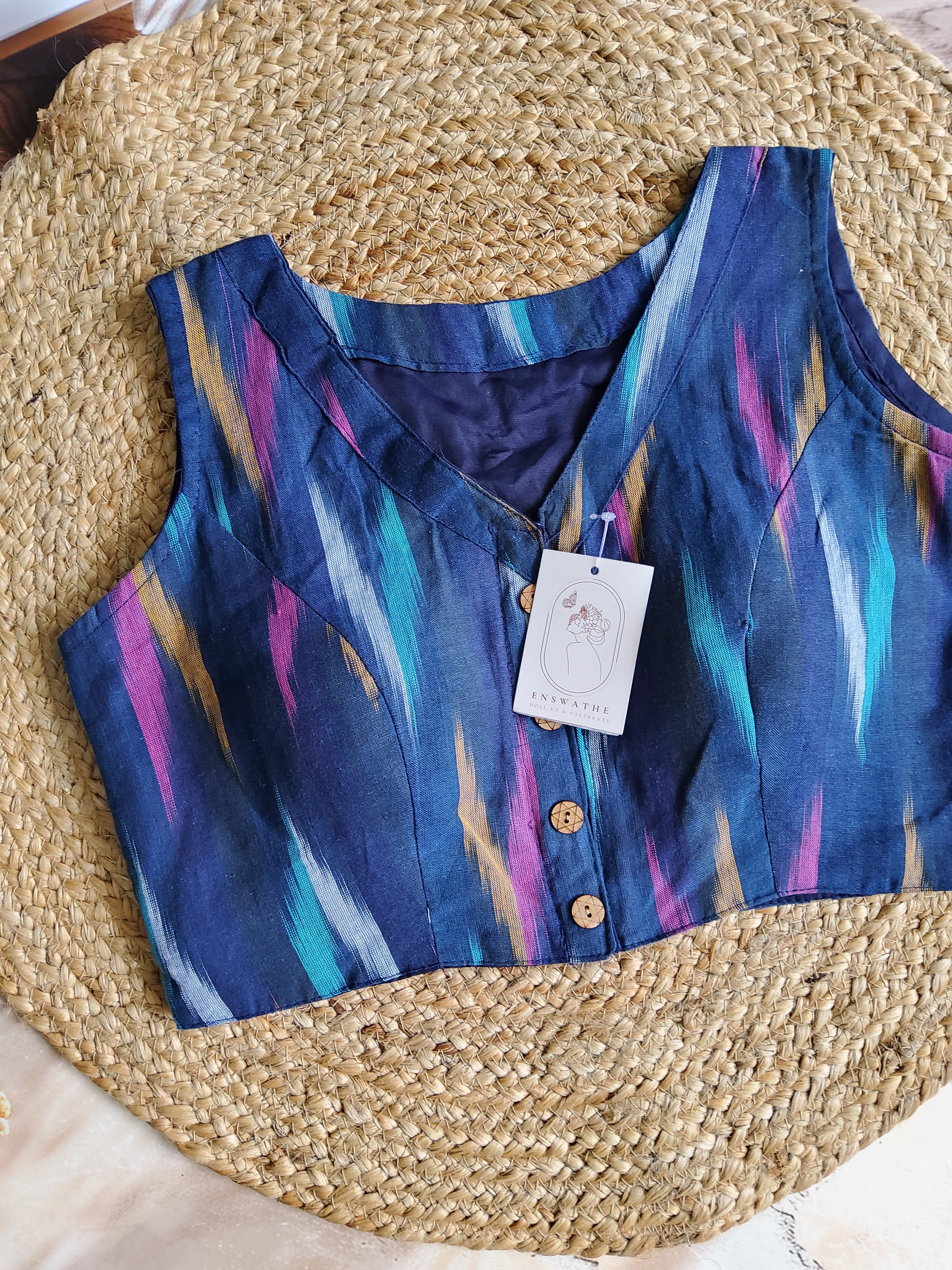 Ikkat V neck sleeveless blouse